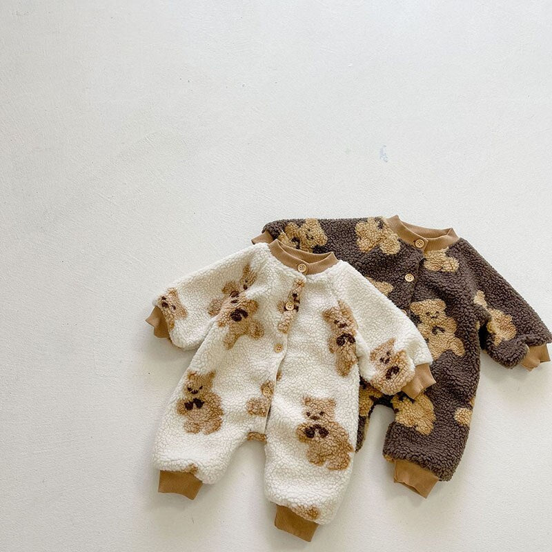 Beige and brown teddy rompers side by side