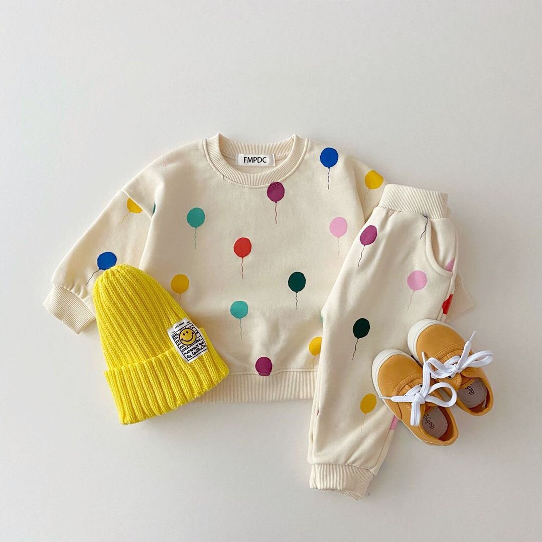 Toddler balloon print sweatshirt and pants set flat lay
