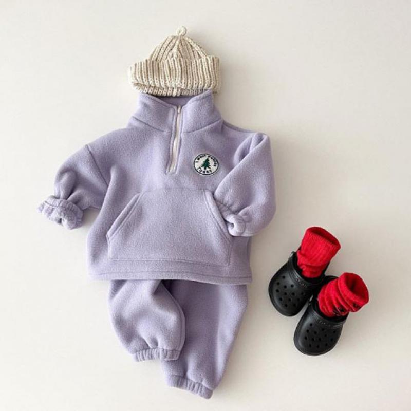 Purple fleece toddler set styled with red boots
