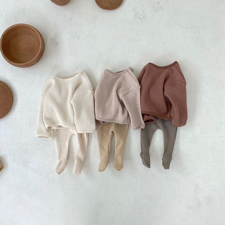 Waffle sweatshirts and pants laid flat