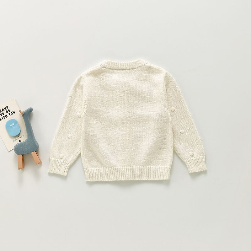 Back view of white knit cardigan