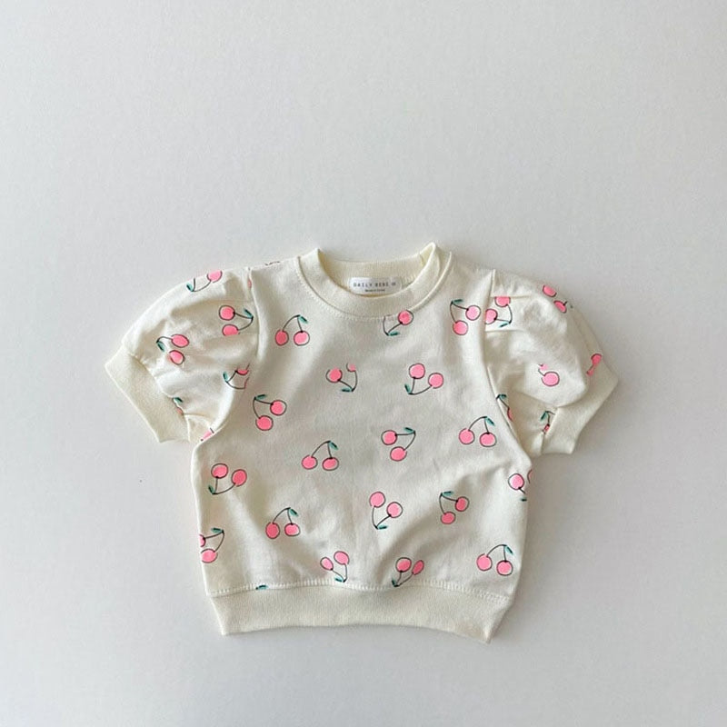 White cherry print puff sleeve top