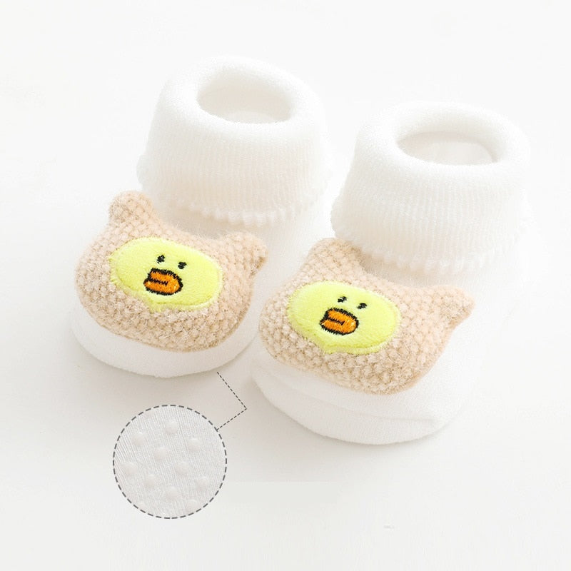 White thick baby socks with duck topper