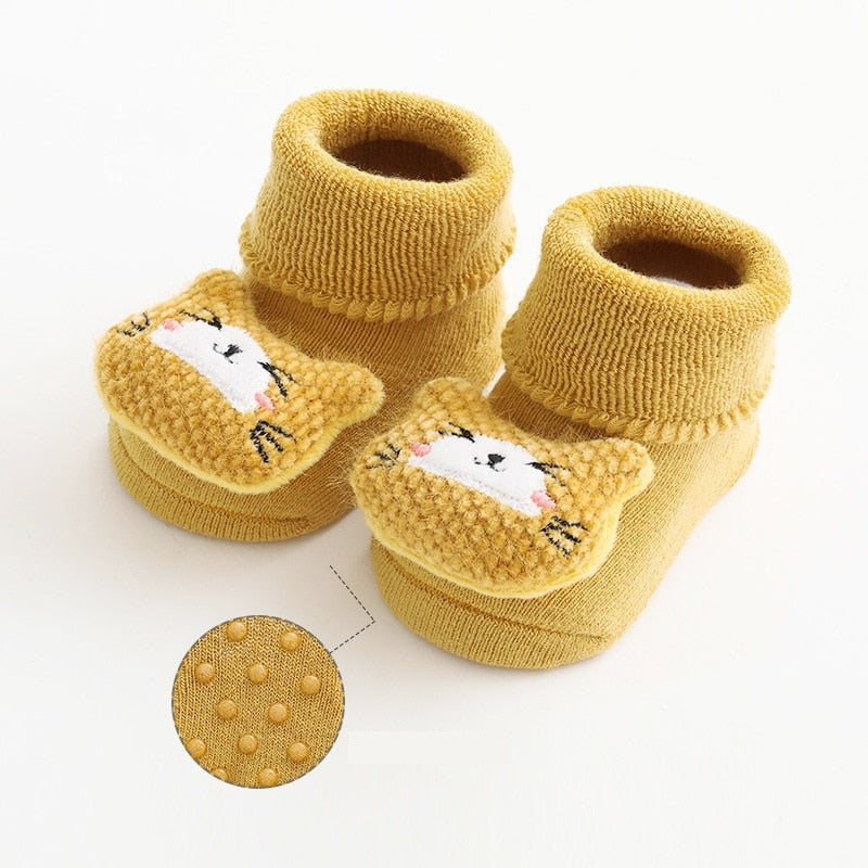 Yellow thick baby socks with cat faces