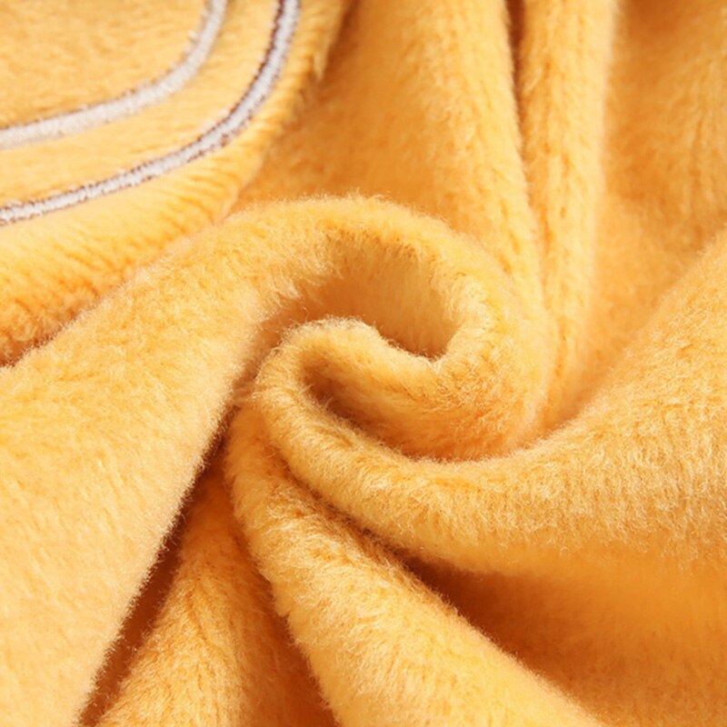 Close-up of yellow plush fleece lining